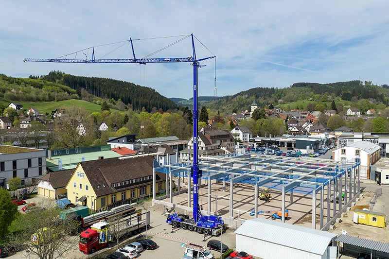 Liebherr MK 120-5.1E mobile construction crane working at a construction site in Lenzkirch in the Black Forest, Germany