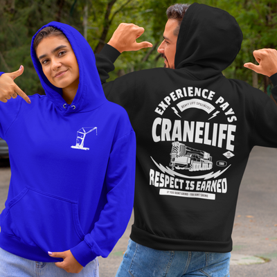 Hispanic couple showing the front and back of their crane operator hoodies with DTG printed designs for crane operators