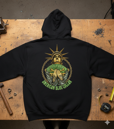 Black hoodie with 'American Blue Collar' graphic on a wooden workbench.