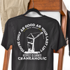 Up close mock up of black craneaholics you're only as good as your last lift t shirt hanging on the back of a chair